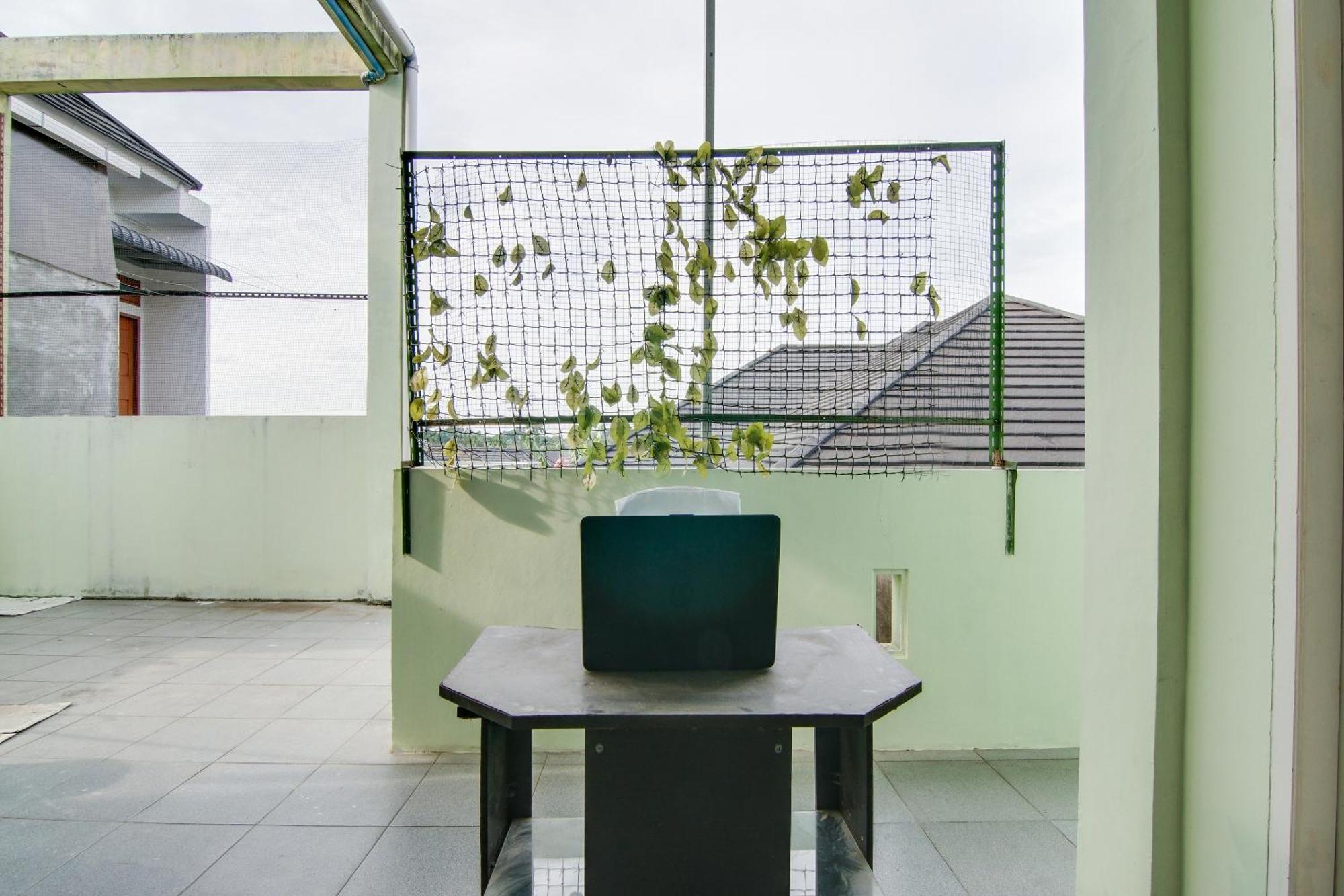 Spot On 91858 Raja Homestay Syariah Pekanbaru Extérieur photo