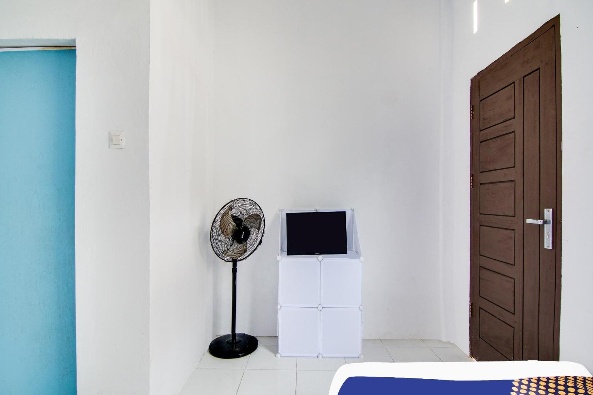 Spot On 91858 Raja Homestay Syariah Pekanbaru Extérieur photo