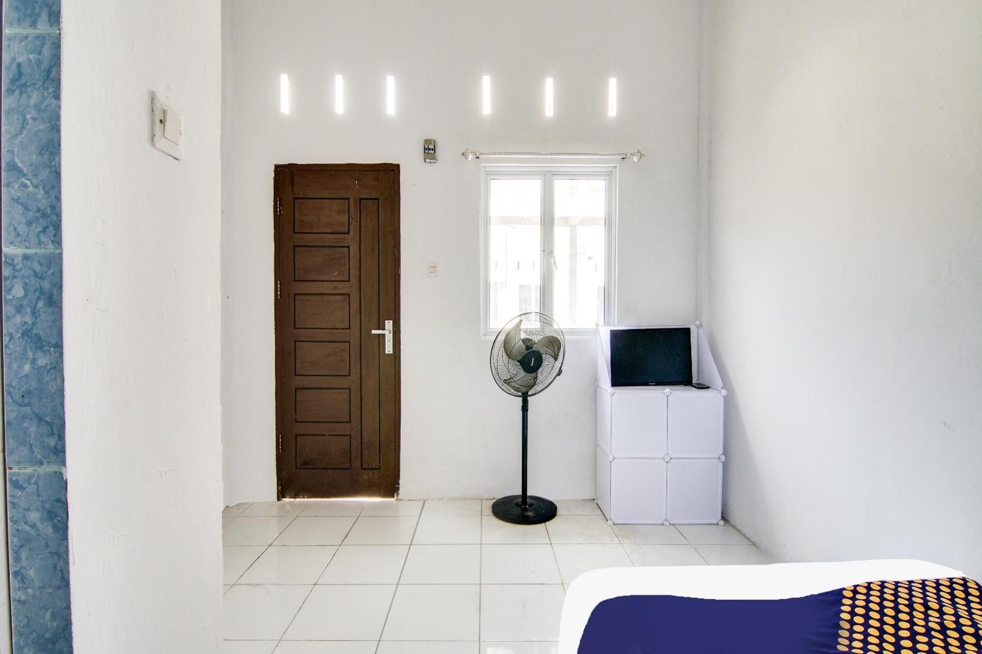 Spot On 91858 Raja Homestay Syariah Pekanbaru Extérieur photo