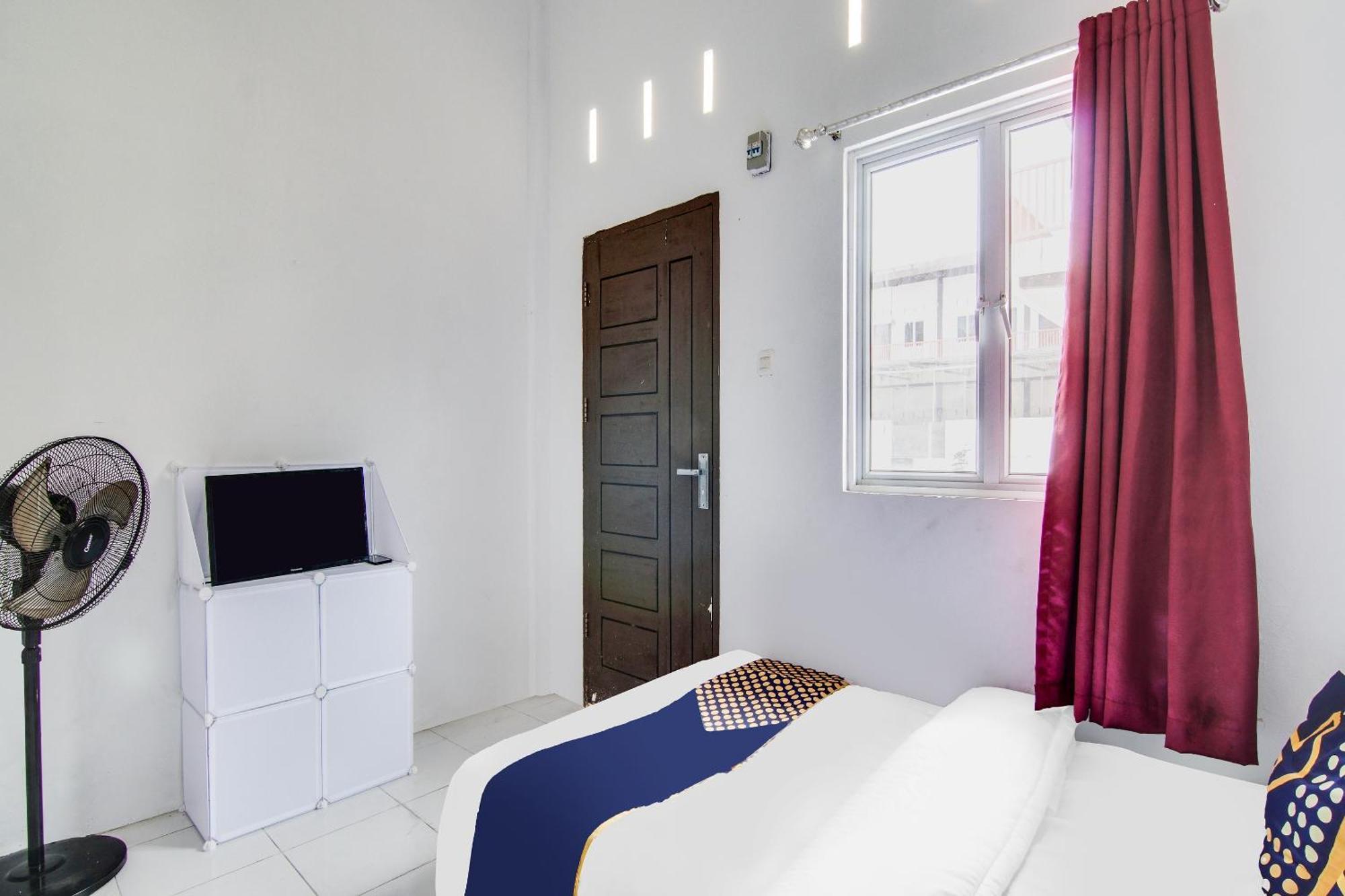 Spot On 91858 Raja Homestay Syariah Pekanbaru Extérieur photo